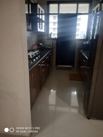 Kitchen in 2 BHK Apartment at Golden Sand Apartments, Dhakoli Village – for Sale