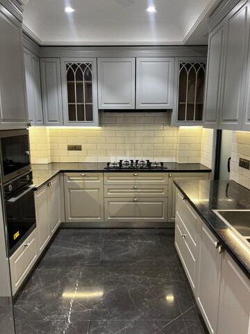 Kitchen in 4 BHK Builder Floor at Ansal Sushant Lok I, Sector 43 – for Sale