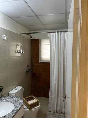 Bathroom in 3 BHK Builder Floor at Vatika India Next Primrose Floors, Sector 82 – for Sale