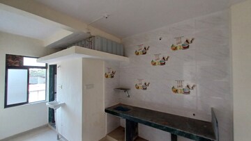 Kitchen in 1 RK Builder Floor at Gurumauli Apartment, Naigaon West – for Sale