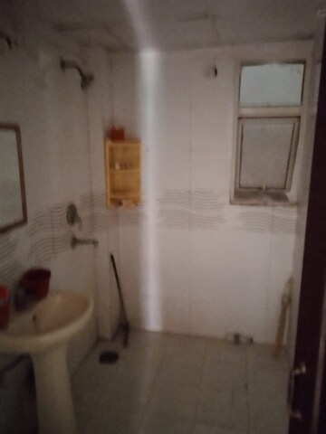 Bathroom in 2.5 BHK Apartment at Amrapali Golf Homes, Sector 4, Greater Noida – for Sale