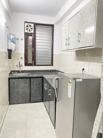 Kitchen in 1.5 BHK Builder Floor at Chattarpur – for Sale