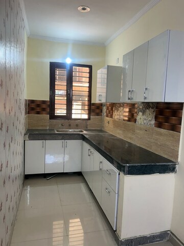 Kitchen in 2 BHK Apartment at Guru Nanak Enclave, Dhakoli Village – for Sale