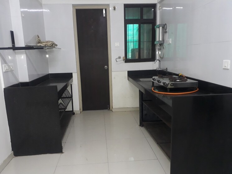 Kitchen, vertical-wisteria 1 Bedroom 428 Sq.Ft. Apartment In Mundhwa Pune 7537058