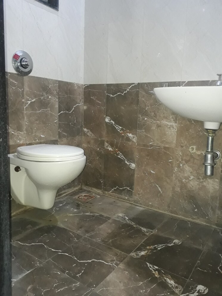 Bathroom, vertical-wisteria 1 Bedroom 428 Sq.Ft. Apartment In Mundhwa Pune 7537058