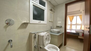 Bathroom in 3 BHK Apartment at Bhartiya Nikoo Homes Phase 2, Thanisandra Main Road – for Sale