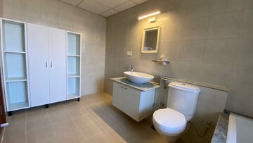 Bathroom in 3 BHK Apartment at Bhartiya Nikoo Homes Phase 2, Thanisandra Main Road – for Sale