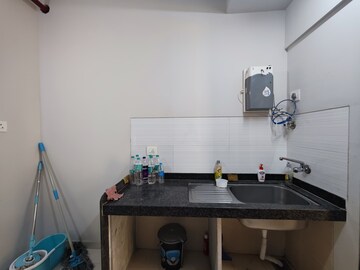 Kitchen in 2 BHK Apartment at Rustomjee Urbania Azziano, Majiwada – for Sale