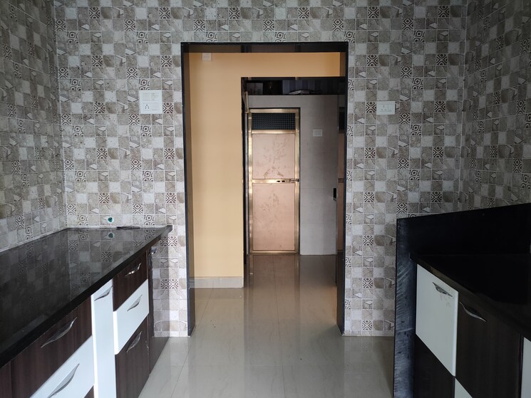 Kitchen, shree-mahaganpati-tower 1 Bedroom 408 Sq.Ft. Apartment In Titwala Thane 7539186