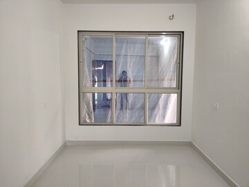 Living Room in 2 BHK Apartment at Titwala – for Sale