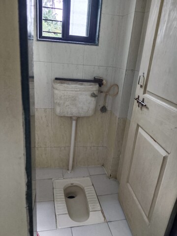 Bathroom in 2 BHK Apartment at Greenland Society, Pimple Saudagar – for Sale