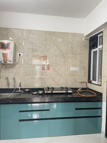 Kitchen in 2 BHK Apartment at Greenland Society, Pimple Saudagar – for Sale