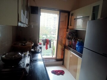 Kitchen in 1 BHK Apartment at Ostwal Pride, Mira Road – for Sale