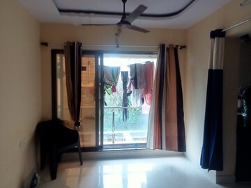 Living Room in 1 BHK Apartment at Ostwal Pride, Mira Road – for Sale