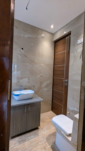 Bathroom in 4 BHK Builder Floor at Green Fields Colony – for Sale