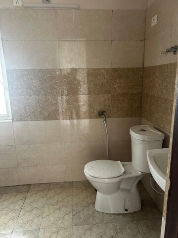 Bathroom in 2.5 BHK Apartment at Mahagun Mywoods, Sector 16c Greater Noida – for Sale