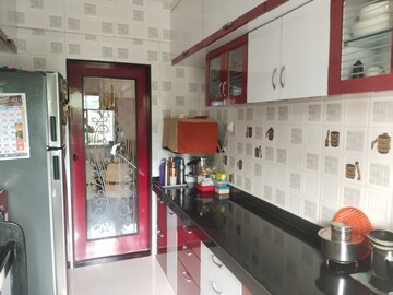 Kitchen in 2 BHK Apartment at Charkop Gaon – for Sale