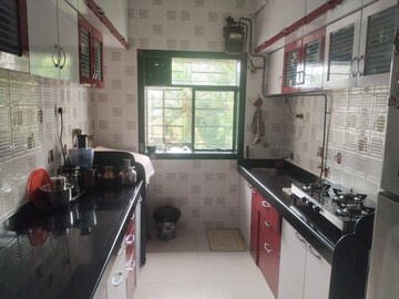 Kitchen in 2 BHK Apartment at Charkop Gaon – for Sale