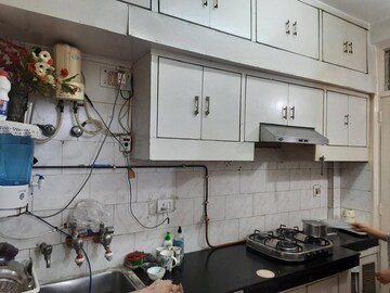 Kitchen in 2.5 BHK Apartment at Vasundhara Enclave – for Sale