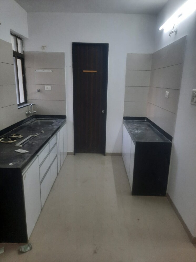 Kitchen, 33-milestone 2 Bedroom 733 Sq.Ft. Apartment In Wakad Pune 7544177