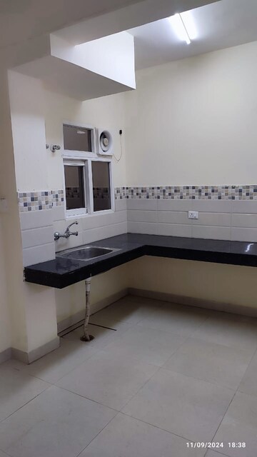 Kitchen in 3 BHK Apartment at Signature Orchard Avenue 2, Sector 93 – for Sale