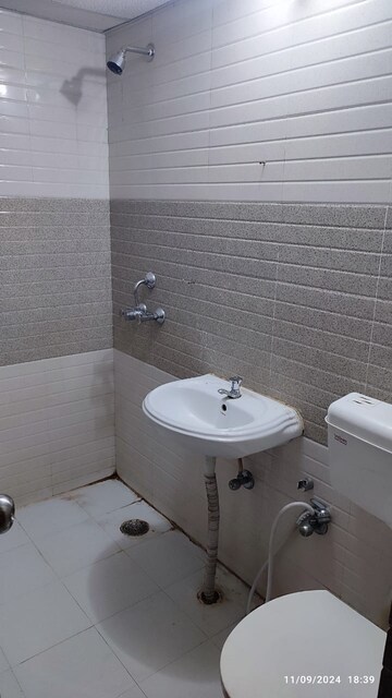 Bathroom in 3 BHK Apartment at Signature Orchard Avenue 2, Sector 93 – for Sale