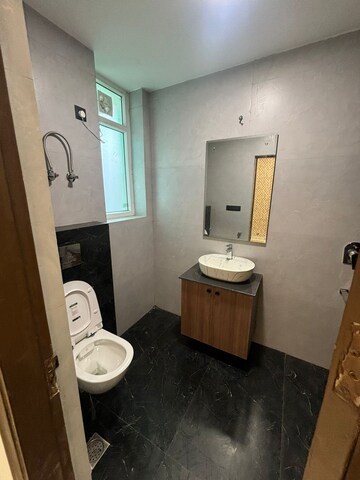 Bathroom in 2.5 BHK Builder Floor at Smart World Gems, Sector 89 – for Sale