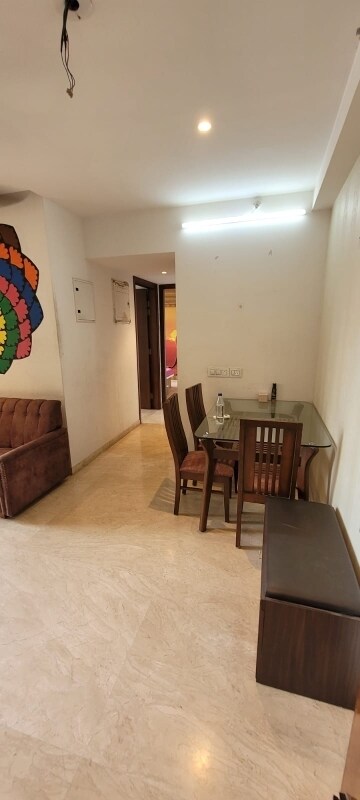 Living Room in 1.5 BHK Apartment at Hiranandani Estate Silverlink, Ghodbunder Road – for Sale