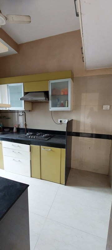Kitchen in 1 BHK Apartment at K Raheja Raheja Residency, Malad East – for Sale