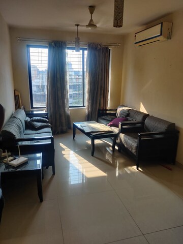 Living Room in 1 BHK Apartment at Ekta Meadows, Borivali East – for Sale