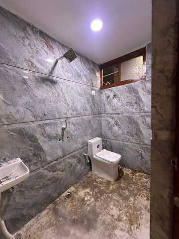 Bathroom in 1 BHK Builder Floor at Chattarpur – for Sale