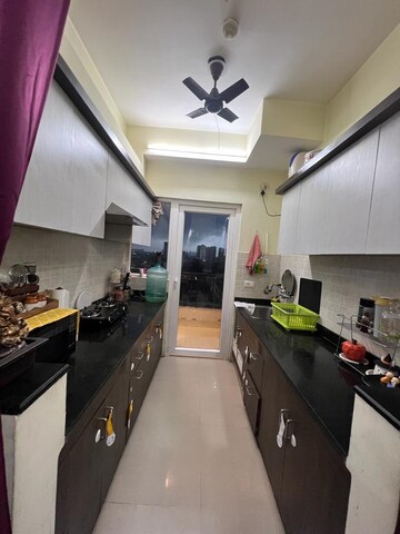 Kitchen in 3 BHK Apartment at Casa Woodstock, Sector 16c Greater Noida – for Sale