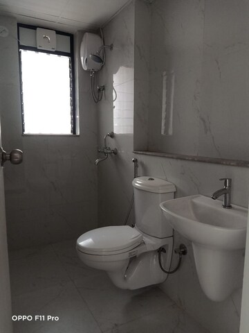 Bathroom in 1 BHK Apartment at Runwal Gardens, Dombivli East – for Sale