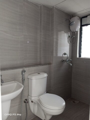 Bathroom in 1 BHK Apartment at Runwal Gardens, Dombivli East – for Sale
