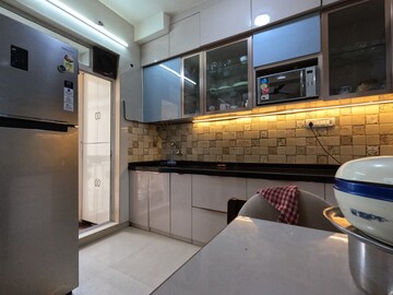 Kitchen in 3 BHK Apartment at Vijay Nakshatra, Ghodbunder Road – for Sale
