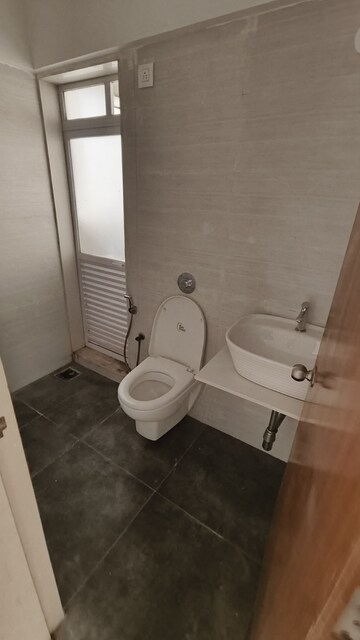 Bathroom in 2 BHK Apartment at Jagdale Amizra, Vartak Nagar – for Sale