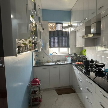 Kitchen in 2.5 BHK Apartment at Raheja Atharva, Sector 109 – for Sale