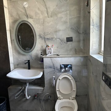 Bathroom in 2.5 BHK Apartment at Raheja Atharva, Sector 109 – for Sale