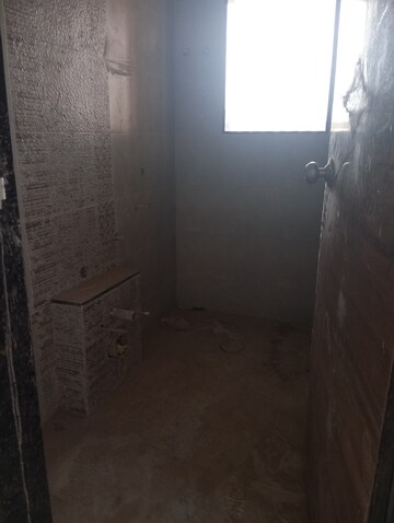 Bathroom in 1 BHK Apartment at KM Horizon Exotica, Haware City – for Sale