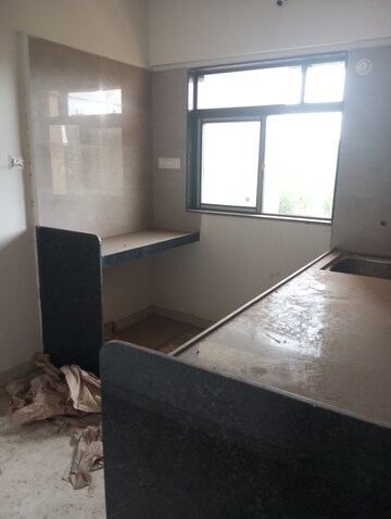 Kitchen in 1 BHK Apartment at KM Horizon Exotica, Haware City – for Sale
