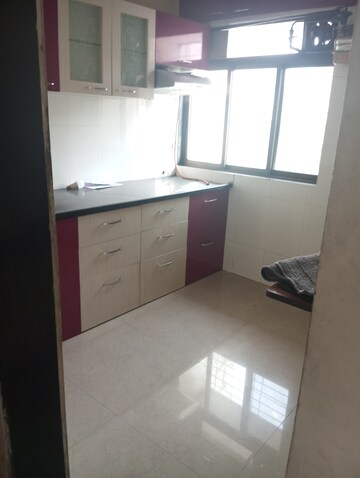 Kitchen in 2 BHK Apartment at Om Sai Plaza, Ghodbunder Road – for Sale