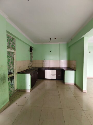 Kitchen in 2.5 BHK Apartment at Panchsheel Wellington, Sain Vihar – for Sale