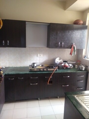 Kitchen in 3 BHK Apartment at Adore Happy Homes Grand, Sector 85 – for Sale