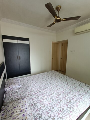 Bedroom in 2 BHK Apartment at Unnati Woods CHS, Kasarvadavali – for Sale