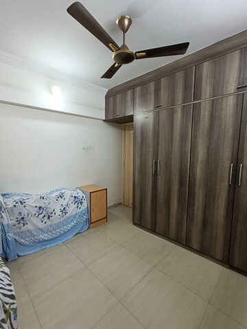 Bedroom in 2 BHK Apartment at Unnati Woods CHS, Kasarvadavali – for Sale