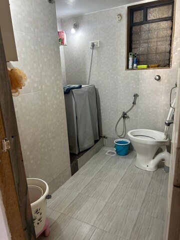 Bathroom in 2 BHK Apartment at Kauls Heritage City Apartment, Vasai West – for Sale