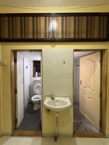 Bathroom in 2 BHK Apartment at Kauls Heritage City Apartment, Vasai West – for Sale