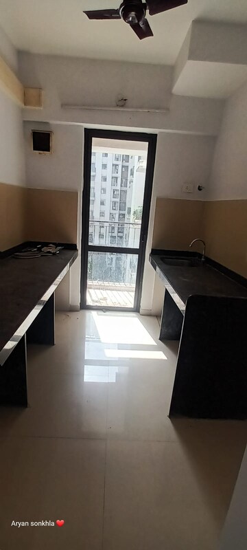 Kitchen in 1.5 BHK Apartment at Lodha Palava City Lakeshore Greens, Dombivli East – for Sale