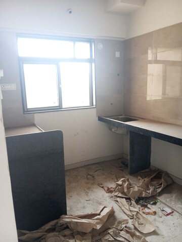 Kitchen in 1 BHK Apartment at KM Horizon Exotica, Haware City – for Sale