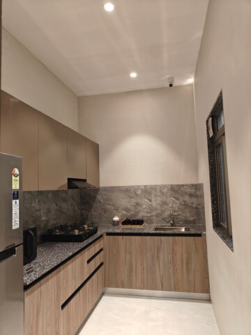 Kitchen in 2 BHK Apartment at Paradigm Alaya, Jogeshwari West – for Sale